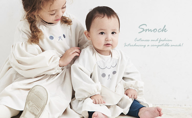 Abooのスモックはドレスのようにかわいく シンプルでおしゃれ さっと着せられて おようふくを汚しません